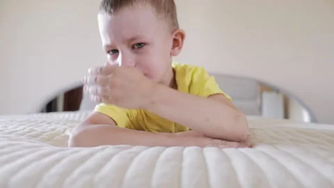 Tears. Portrait of a Crying Boy Lying on the Bed. Resentment, Annoyance. Stock Footage 156300943