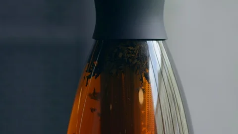 Teas in a clear liquid on a bar counter in a restaurant Video stock 129580079