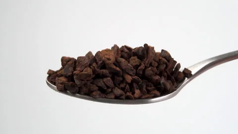 Teaspoon with dried instant chicory root granules Stock Footage 152143893