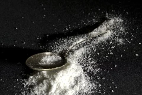 Teaspoon with salt Stock Photos