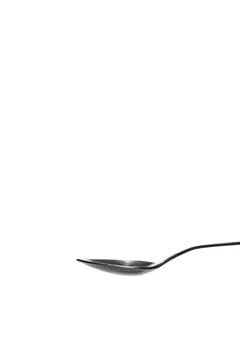 Teaspoon side view with reflection isolated on white background Stock Photos