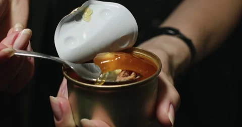 Teaspoon to take a portion of jelly Stock Footage 344900692