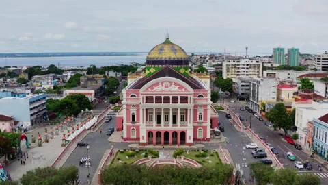 Teatro Amazonas opera house front facade aerial drone view, Rio Negro horizon Stock Footage 346117285