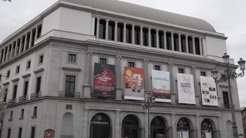 Teatro Real opera house facade displaying event posters along the historic Stock Footage 334453913
