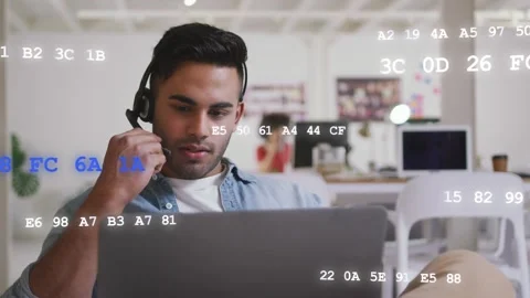 Tech agent using laptop, adjusting mic, speaking, typing while code overlay Stock Footage 333657495