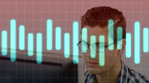 Tech analyst analyzing monitor while data feed starting cyan bars shifting, Stock Footage 333034986