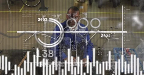 Tech assembling parts at bench, timeline graphics appearing and showing history, Stockbeeldmateriaal 321099613