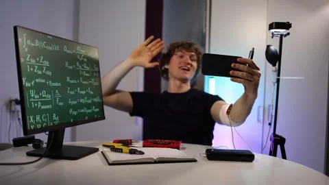 Tech blogger tests experimental technology on himself in home lab Stock Footage 324442707