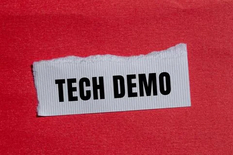 Tech Demo message written on ripped torn paper background. Conceptual Tech .. Stock Photos