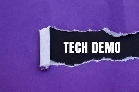 Tech Demo message written on ripped torn paper background. Conceptual Tech .. Stock Photos