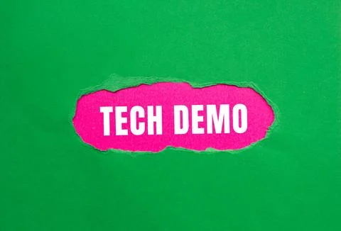 Tech Demo message written on ripped torn paper background. Conceptual Tech .. Stock Photos