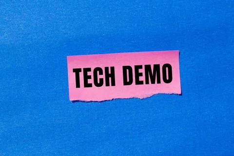 Tech Demo message written on ripped torn paper background. Conceptual Tech .. Stock Photos
