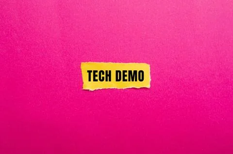 Tech Demo message written on ripped torn paper background. Conceptual Tech .. Stock Photos
