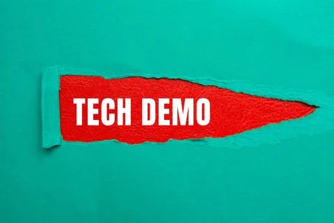 Tech Demo message written on ripped torn paper background. Conceptual Tech .. Stock Photos