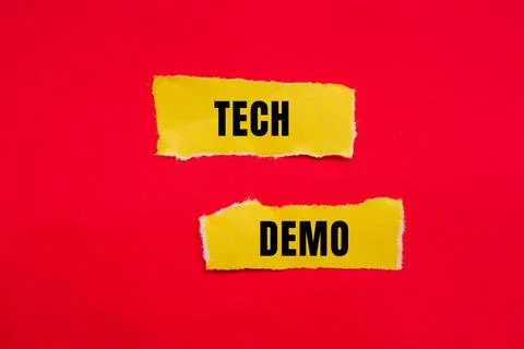 Tech Demo message written on ripped torn paper background. Conceptual Tech .. Stock Photos