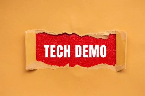 Tech Demo message written on ripped torn paper background. Conceptual Tech .. Stock Photos