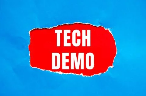 Tech Demo message written on ripped torn paper background. Conceptual Tech .. Stock Photos