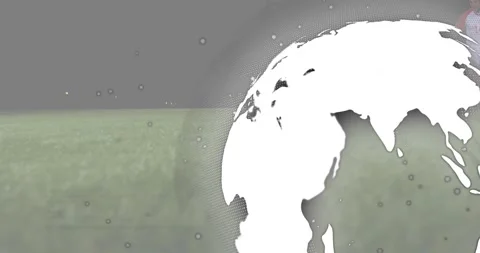 Tech demo showing globe rotating over code soccer ball rolling grass causing Stock Footage 318758518