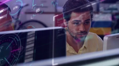 Tech dev noticing live data updating, checking keys, leaning, discussing with Stock Footage 334743830