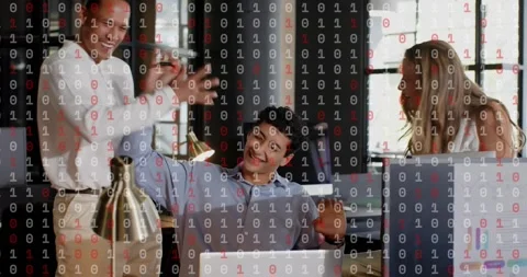 Tech developer inputting code triggers binary digits floating while colleagues Stock Footage 318140672