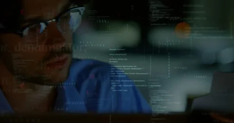 Tech developer wearing glasses reacting to code overlay on lenses, shifting gaze Vidéo 330355241