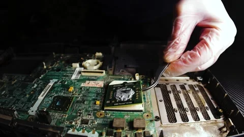 Tech diagnoses, repairs, upgrades computers, troubleshoots hardware Video stock 262435049