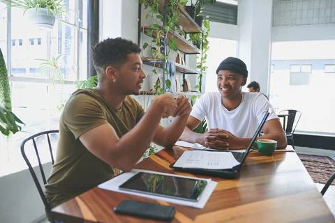 Tech, discussion or people with remote work in cafe, web traffic data revie.. Stock Photos
