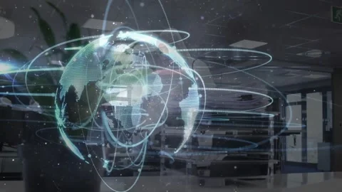Tech engineer activating console and causing holographic globe spiraling arcs Stock Footage 329367163