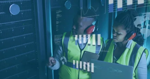 Tech engineers pointing servers and checking laptop while charts and code Stock Footage 312486078