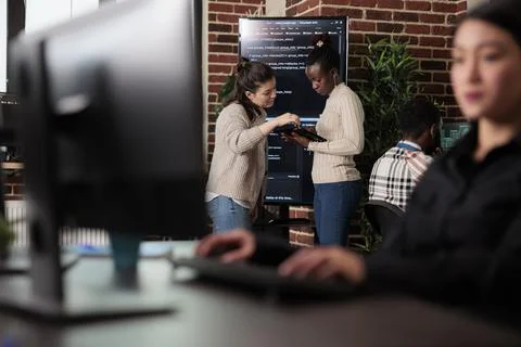 Tech engineers trying to solve storage space problem by using advanced Stock Photos
