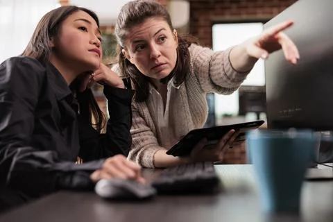 Tech enginners collaborating on coding project Stock-Fotos