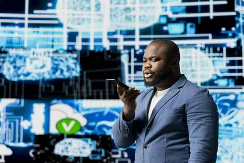 Tech entrepreneur talking on a phone call in a digital AI environment Stock Photos