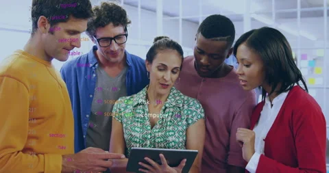 Tech experts leaning around tablet in office, interacting with code overlay Stock Footage 307439974