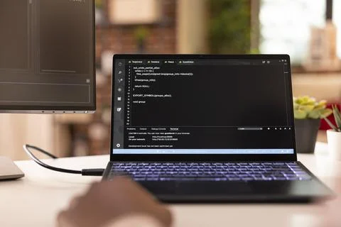 Tech Freelancer Writing Software Code Stock Photos