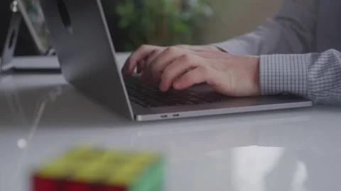 Tech Guy Typing Fast on His Laptop Keyboard Stock Footage 208797721