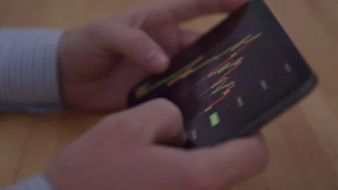 Tech Guys Hands Going over a Graph on a Tablet Stock Footage 208798493
