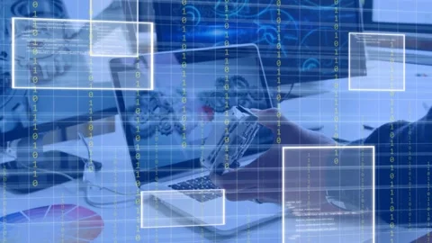 Tech hand rotating gripper over laptop bringing near CAD screen and showing Stock Footage 334729131