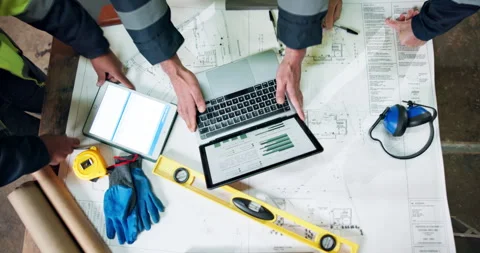 Tech, hands and men with blueprint for construction, layout and budget for Stock Footage 338050229