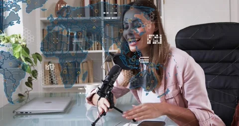 Tech host adjusting mic speaking with map evolving into hex overlay showing Stock Footage 319678179