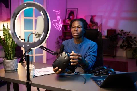 Tech Influencer Demonstrating Virtual Reality Technology Stock Photos