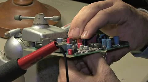 Tech Installing Capacitors in PCB Card Module Stock Footage 10987214