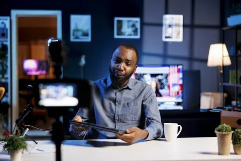 Tech internet show host films tutorial Stock Photos