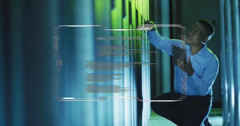 Tech kneeling by server rack tapping tablet starting holo UI glitching then Stock Footage 333968179