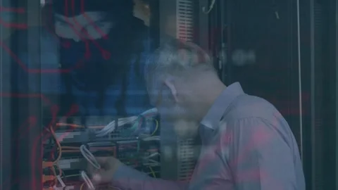 Tech leaning forward tracing and reconnecting cables, restoring network, blue Stock Footage 332746971