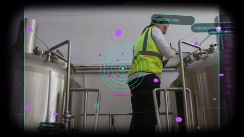 Tech lifting manway, inspecting right plant tank and adjusting fittings while AR Stock Footage 333019300