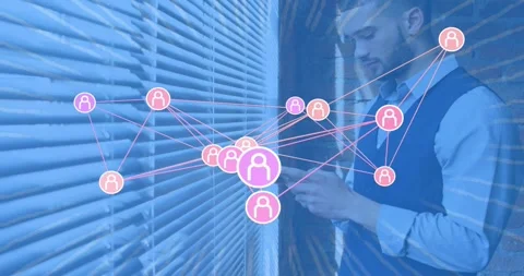Tech manager tapping phone by blinds and causing network nodes lighting and Stock Footage 329833210