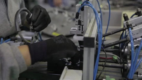 Tech manufacturing hands closeup sho Stock Footage 142736574