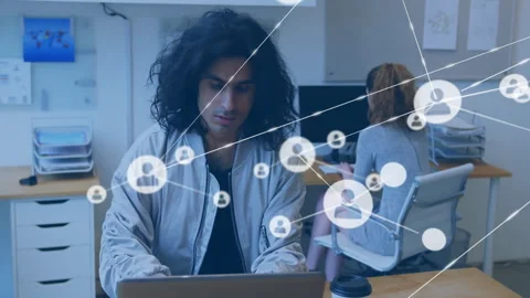 Tech office worker typing on laptop activating network icons forming info web Stock Footage 310644201