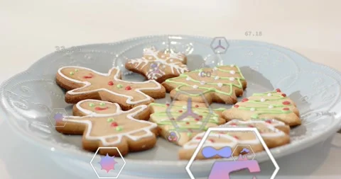 Tech overlays fading and animating CO2 data on plate of gingerbread cookies on Stock Footage 320088173