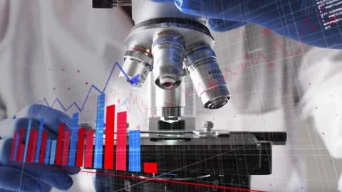 Tech placing slide in lab, rotating turret and focusing for data and starting Stock Footage 335317121